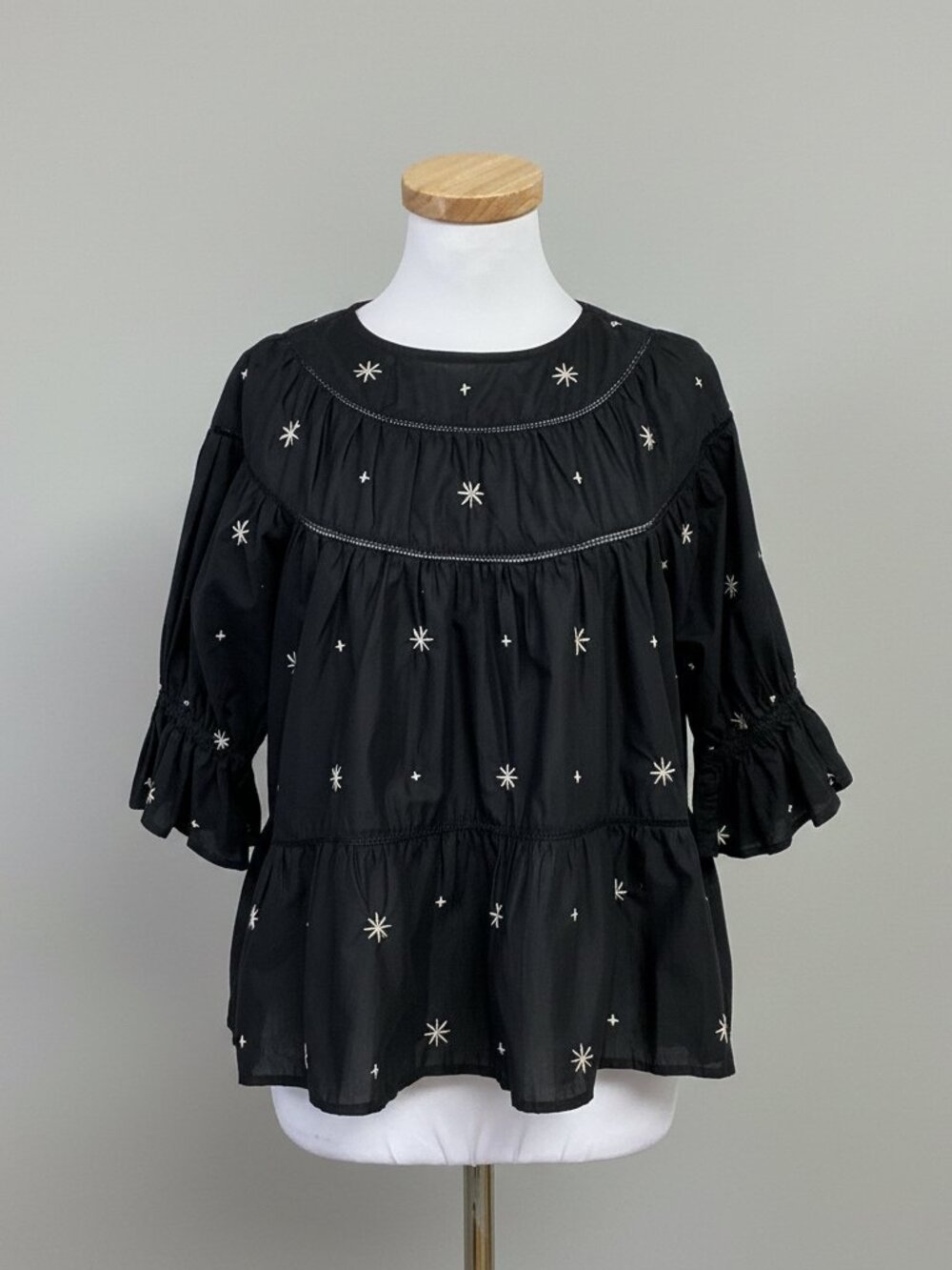 Merlette black Sol top with tan stars, size XS
